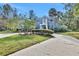 Grand two-story home with a lush green lawn at 2229 Earleaf Ct, Longwood, FL 32779