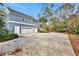 Spacious three-car garage with ample parking space at 2229 Earleaf Ct, Longwood, FL 32779