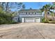 Three-car garage with large driveway at 2229 Earleaf Ct, Longwood, FL 32779