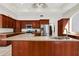 Kitchen with granite countertops and stainless steel appliances at 2229 Earleaf Ct, Longwood, FL 32779