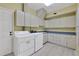 Laundry room with washer, dryer, and ample storage at 2229 Earleaf Ct, Longwood, FL 32779
