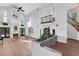 Two story foyer, hardwood floors, fireplace, balcony at 2229 Earleaf Ct, Longwood, FL 32779
