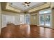 Spacious main bedroom with hardwood floors, large windows, and walk-in closet at 2229 Earleaf Ct, Longwood, FL 32779