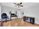 Home office with wood floors and built-in desk at 2229 Earleaf Ct, Longwood, FL 32779