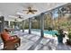 Screened pool and patio area with lounge chairs at 2229 Earleaf Ct, Longwood, FL 32779