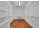 Bright walk-in closet with ample shelving and hanging space at 2229 Earleaf Ct, Longwood, FL 32779
