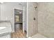 Main bathroom with walk-in shower and granite vanity at 25 Locust Loop Ln, Ocala, FL 34472