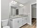Modern bathroom with double vanity and granite countertop at 25 Locust Loop Ln, Ocala, FL 34472