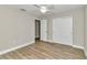 Bright bedroom with ceiling fan and double door closet at 25 Locust Loop Ln, Ocala, FL 34472