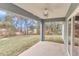 Covered patio with ceiling fan, overlooking backyard at 25 Locust Loop Ln, Ocala, FL 34472