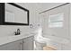 Clean bathroom with a tub and gray vanity at 2800 E Anderson St, Orlando, FL 32803