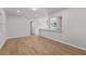 Light and airy dining area with wood-look floors and kitchen views at 2800 E Anderson St, Orlando, FL 32803