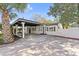 Updated home exterior boasts carport and charming curb appeal at 2800 E Anderson St, Orlando, FL 32803