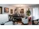 Elegant dining room with a large table and hardwood floors at 293 Scottsdale Sq # 293, Winter Park, FL 32792