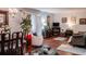 Spacious living room with hardwood floors and ample natural light at 293 Scottsdale Sq # 293, Winter Park, FL 32792