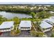 Community overview showcasing lakefront location and townhomes at 4503 Ring Neck Rd # B, Orlando, FL 32808