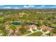 Aerial view showing homes near golf course and water at 545 Brown Pelican Dr, Daytona Beach, FL 32119