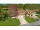 Aerial view of two-story townhouses near a pond at 545 Brown Pelican Dr, Daytona Beach, FL 32119