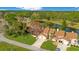 Aerial view of two-story townhouses with golf course views at 545 Brown Pelican Dr, Daytona Beach, FL 32119