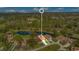 Aerial close-up view of home and surrounding area at 545 Brown Pelican Dr, Daytona Beach, FL 32119