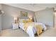 Bright bedroom with gray walls, plush bedding, and ample natural light at 545 Brown Pelican Dr, Daytona Beach, FL 32119