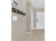 Bright entryway with tile flooring, key hooks, and neutral walls at 600 Northern Way # 801, Winter Springs, FL 32708