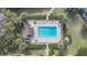 Community pool with lounge chairs at 600 Northern Way # 801, Winter Springs, FL 32708