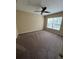 Bedroom with carpet flooring and a ceiling fan at 6348 Raleigh St # 1311, Orlando, FL 32835