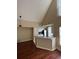 Kitchen features a breakfast bar and hardwood floors at 6348 Raleigh St # 1311, Orlando, FL 32835