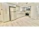 Modern kitchen with stainless steel appliances and gray cabinets at 6668 Pompeii Rd, Orlando, FL 32822