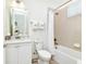 Clean bathroom with a tub, shower, and vanity at 8019 Knee Deep Rd, Kissimmee, FL 34747