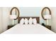 Bedroom with a queen bed and nightstands at 8019 Knee Deep Rd, Kissimmee, FL 34747