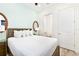 Bedroom with a queen bed and en-suite bathroom at 8019 Knee Deep Rd, Kissimmee, FL 34747