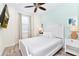 Bedroom with a queen bed, nightstands and TV at 8019 Knee Deep Rd, Kissimmee, FL 34747