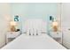Bedroom with a queen bed and nightstands at 8019 Knee Deep Rd, Kissimmee, FL 34747