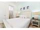 Bedroom with queen bed and ensuite bathroom at 8019 Knee Deep Rd, Kissimmee, FL 34747