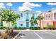 Two-story light blue home with landscaping at 8019 Knee Deep Rd, Kissimmee, FL 34747
