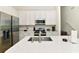 Modern kitchen with stainless steel appliances and island at 8019 Knee Deep Rd, Kissimmee, FL 34747