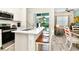 Modern kitchen with stainless steel appliances and island at 8019 Knee Deep Rd, Kissimmee, FL 34747