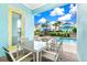 Outdoor patio with dining table and chairs at 8019 Knee Deep Rd, Kissimmee, FL 34747