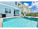 Private pool and spa with patio furniture and grill at 8019 Knee Deep Rd, Kissimmee, FL 34747
