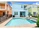 Private pool with spa and patio, plus outdoor dining area at 8019 Knee Deep Rd, Kissimmee, FL 34747