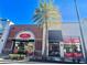 Exterior view of the World Famous Pralines store in a shopping center at 8019 Knee Deep Rd, Kissimmee, FL 34747