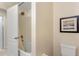 Clean bathroom with shower/tub combo and toilet at 8145 Roseville Blvd, Davenport, FL 33896