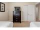 Bedroom with two twin beds and dresser at 8145 Roseville Blvd, Davenport, FL 33896