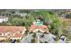 Aerial view of community pool, clubhouse, and surrounding area at 8145 Roseville Blvd, Davenport, FL 33896