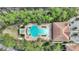 Aerial view of community pool and surrounding patio area at 8145 Roseville Blvd, Davenport, FL 33896