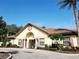 Community clubhouse with attractive landscaping at 8145 Roseville Blvd, Davenport, FL 33896