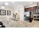 Modern kitchen with stainless steel appliances and granite countertops at 8145 Roseville Blvd, Davenport, FL 33896