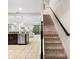 Staircase view of kitchen and living room at 8145 Roseville Blvd, Davenport, FL 33896